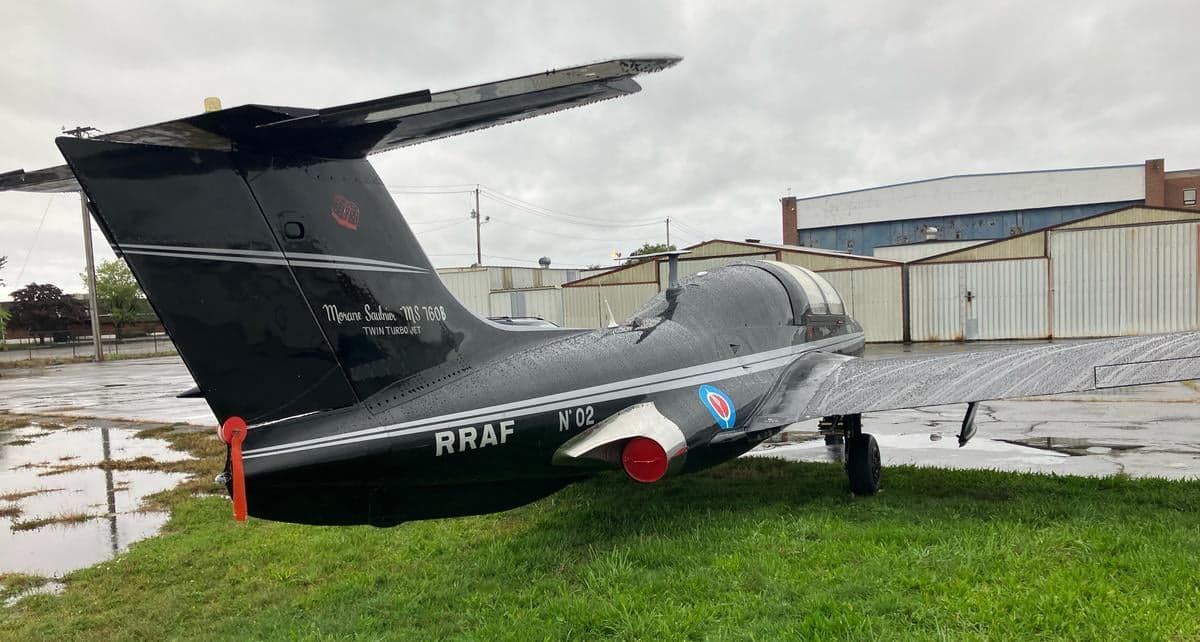 Rear view of a Fouga CM.170 Magister, also known as a Paris II, parked on the grass.