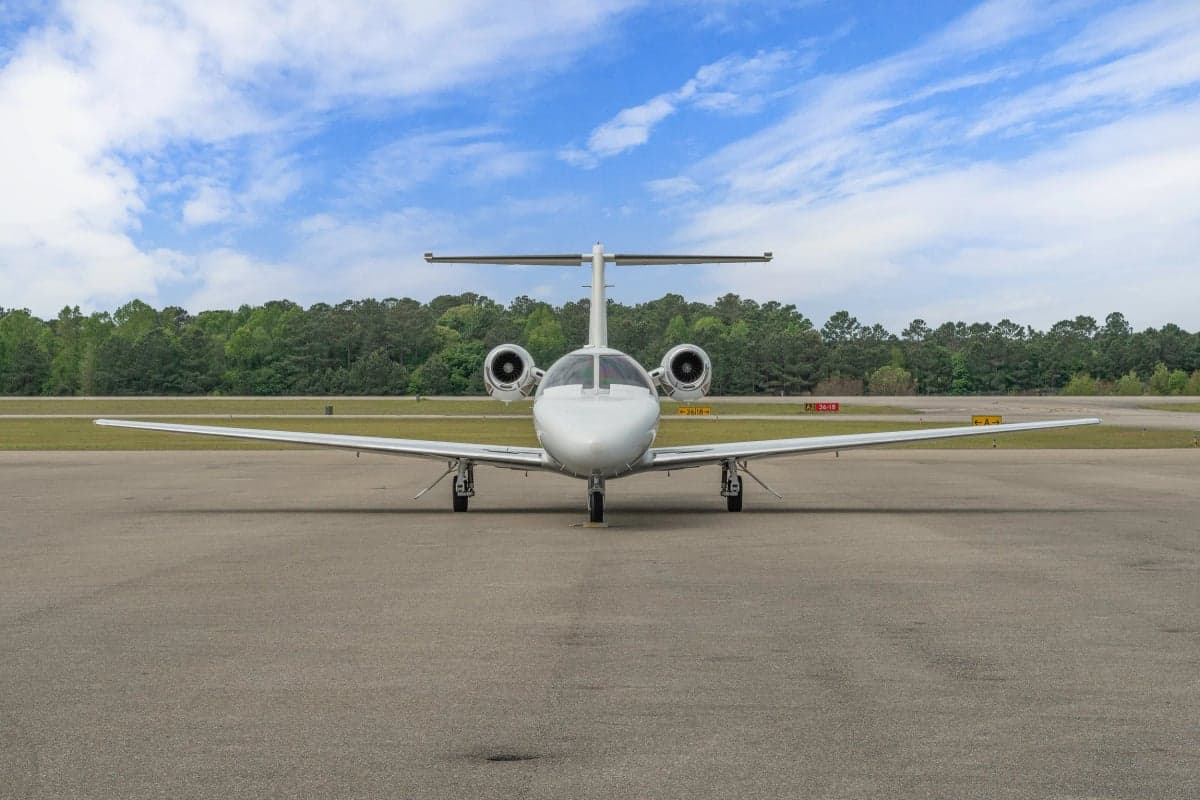 Front view of a Cessna Citation CJ1 parked on the tarmac.