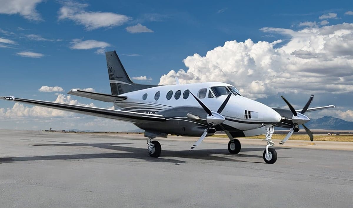 A Beechcraft King Air parked on the tarmac.