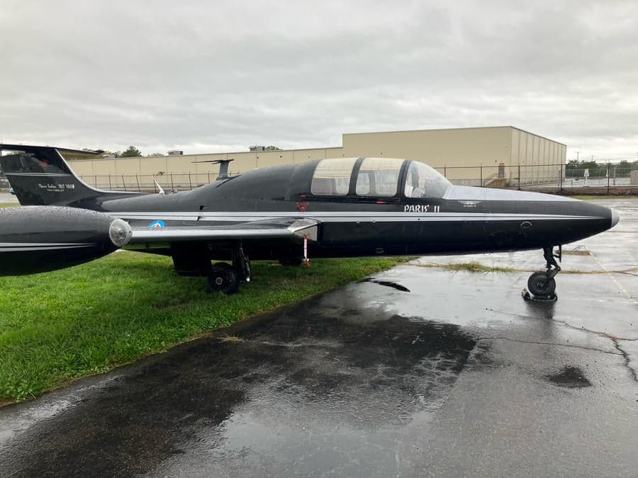Side view of a Fouga CM.170 Magister, also known as a Paris II, parked on the tarmac.