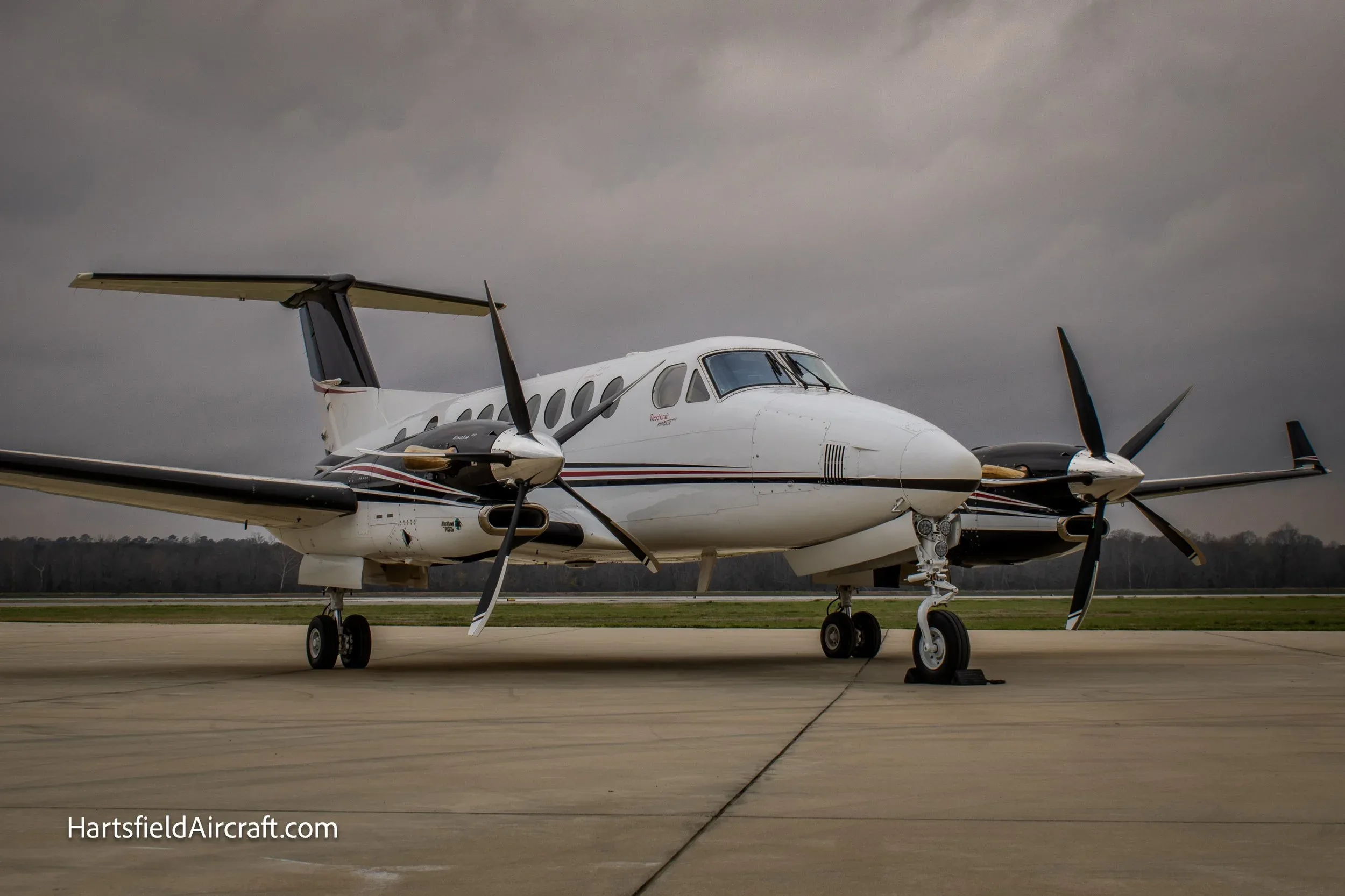 Front side view of a King Air 360 on the tarmac.