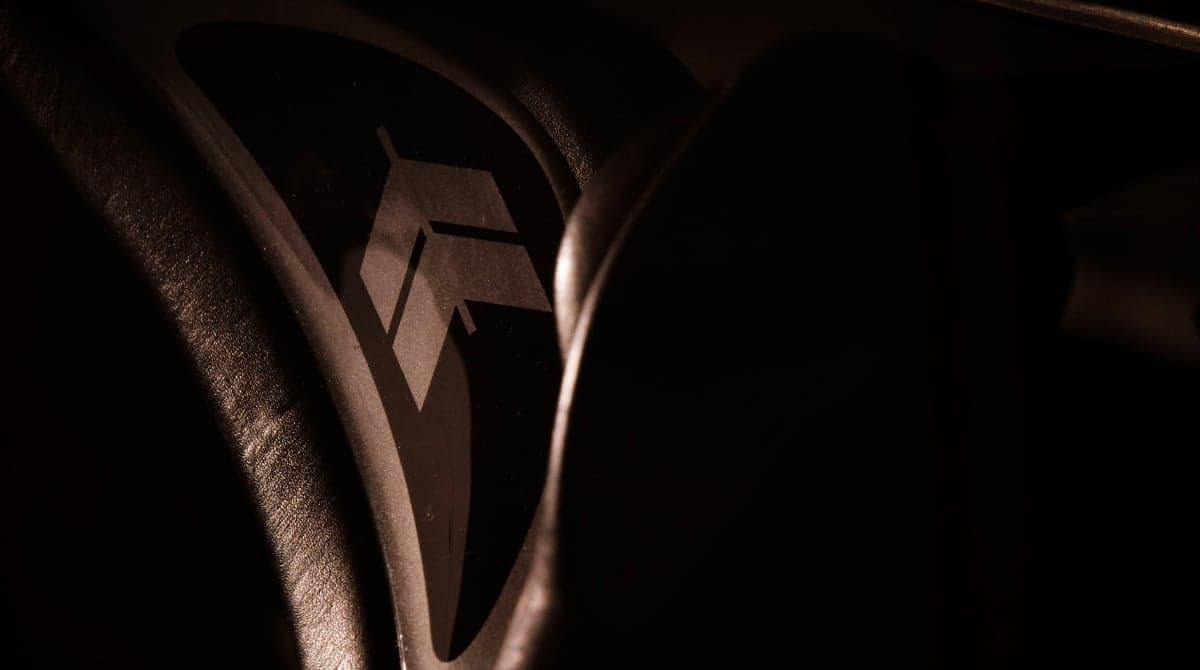 Close up of the aircraft's seat with logo.
