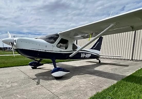 A Glasair Sportsman aircraft parked on the tarmac.