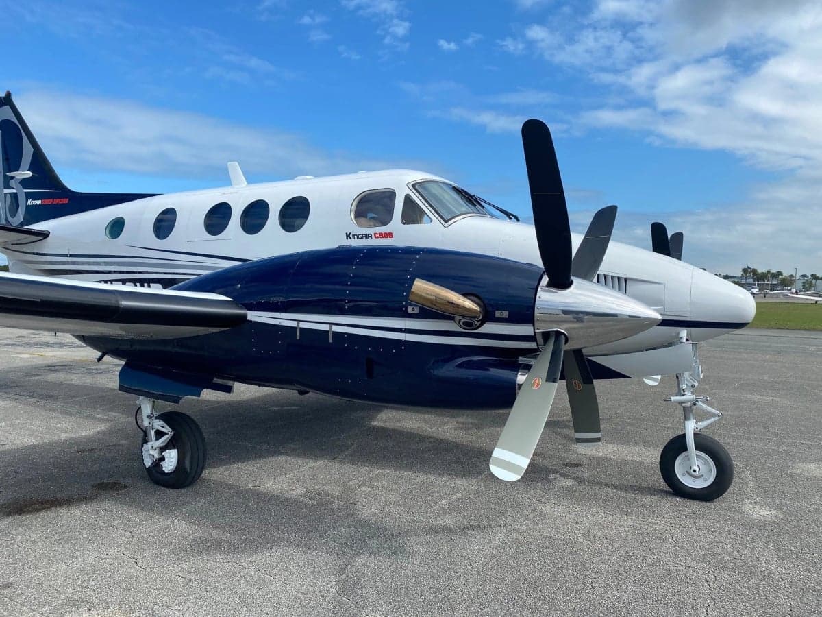 Close up of N70VR Beechcraft King Air nose and propeller.