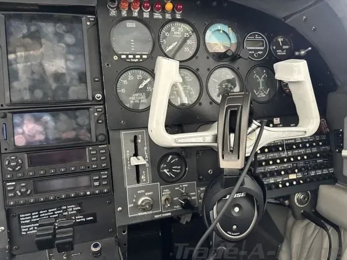Close-up view of the cockpit instrument panel and controls of the N2UB aircraft.