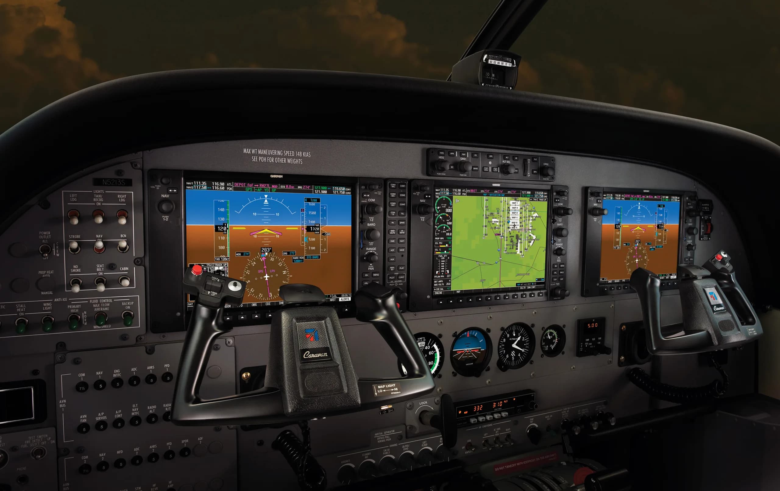 Detailed view of the aircraft's glass cockpit instrument panel.