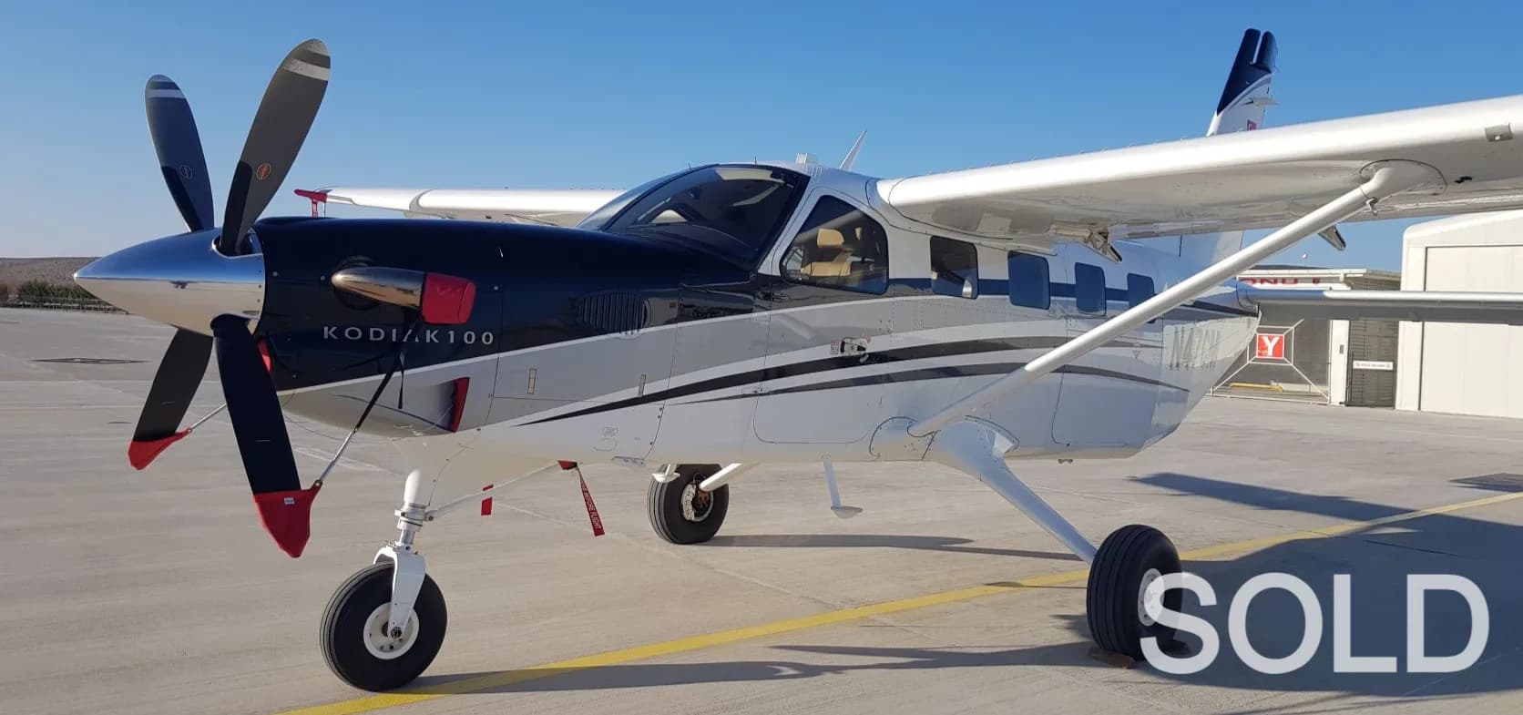 A Quest Kodiak 100 aircraft on the ground with a SOLD overlay.