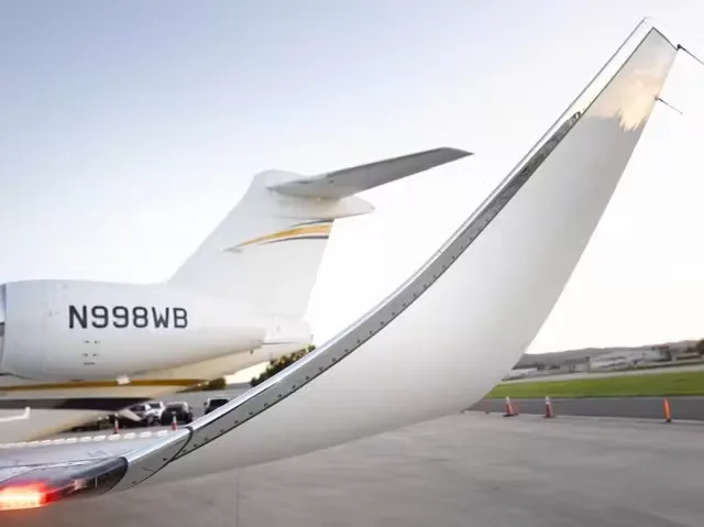 Close up of the winglet and tail of a Bombardier Global Express business jet.