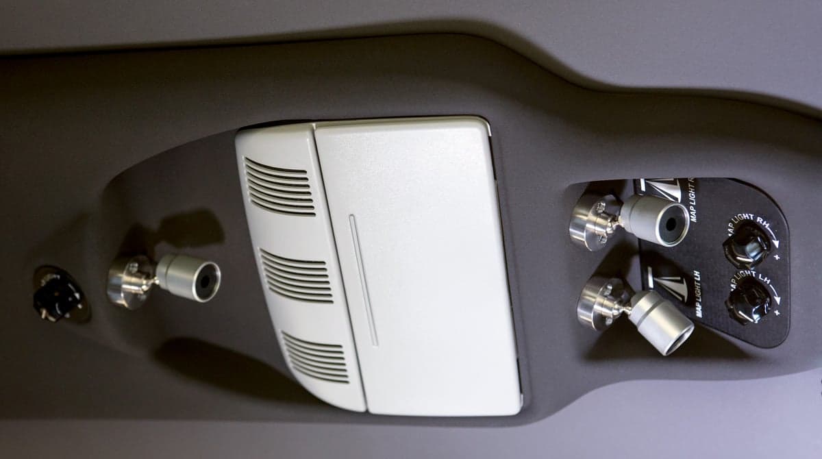 Overhead view of the aircraft's interior lighting and controls.