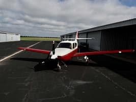 Front view of the N768F aircraft parked on the tarmac.