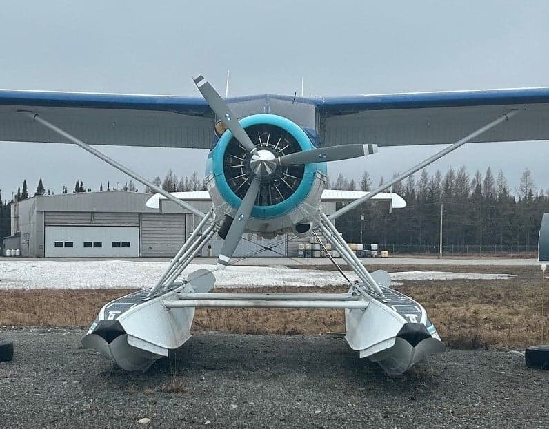 Front view of the De Havilland DHC-2 Beaver floatplane, showing the propeller and floats.