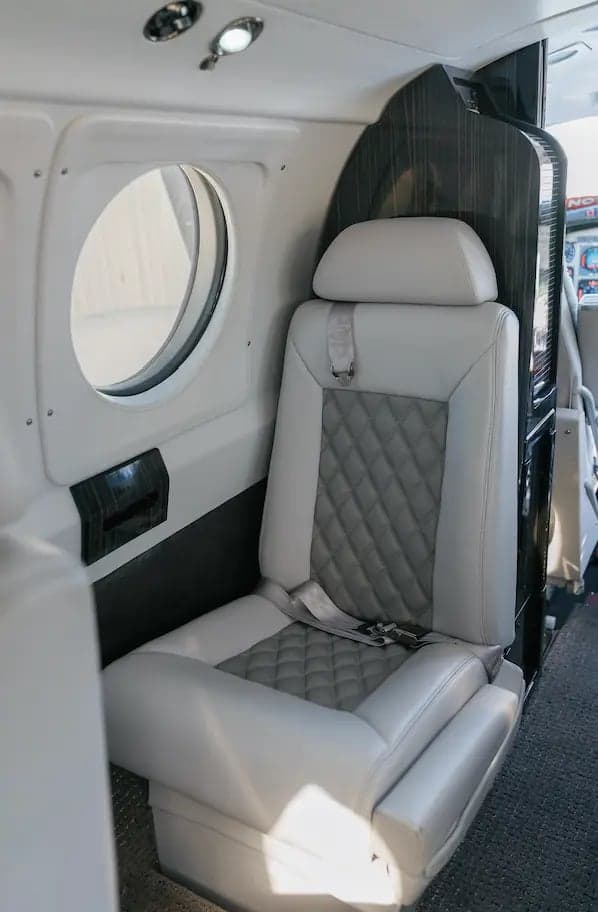 A single seat inside the King Air B200 aircraft.