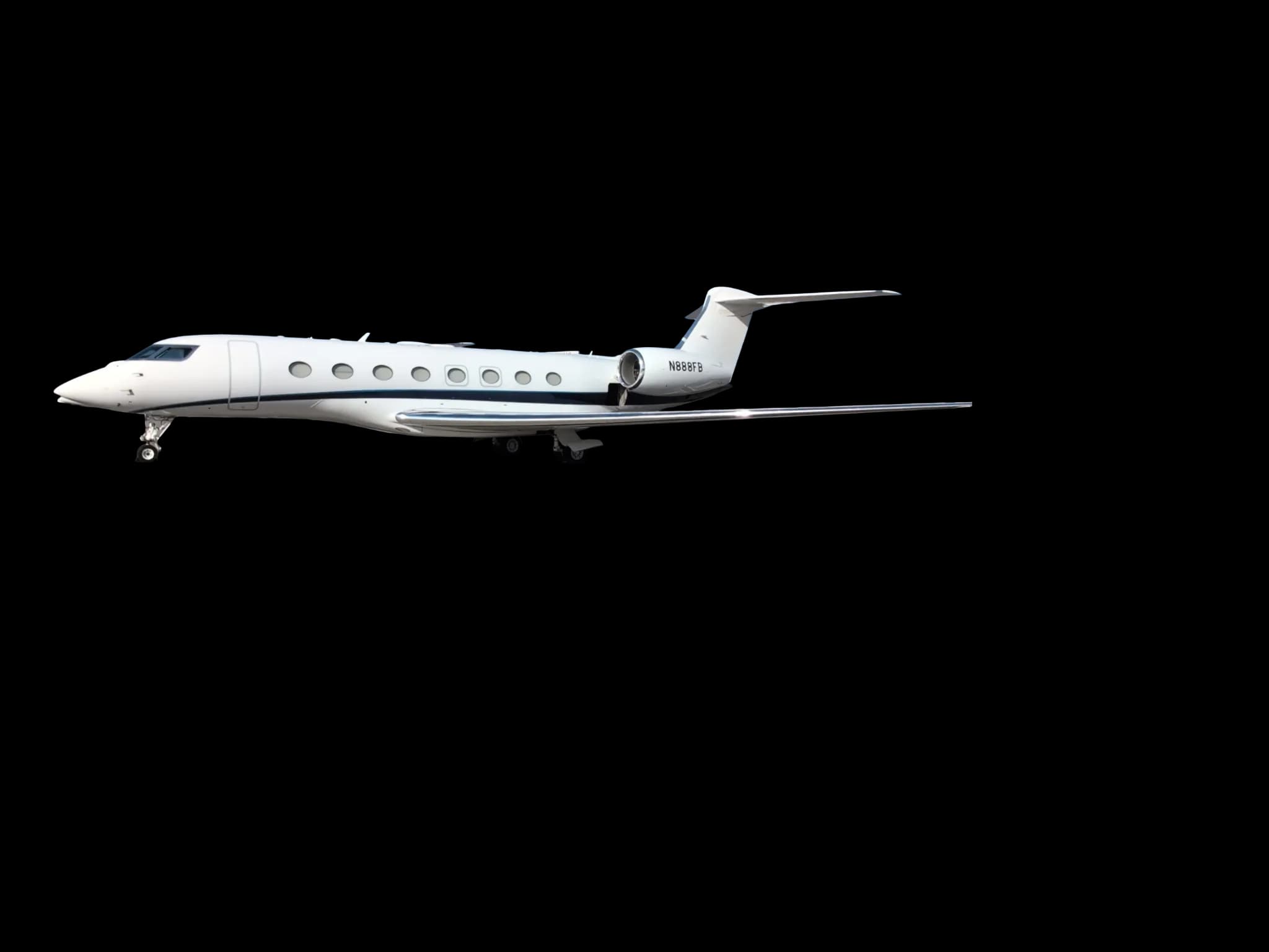 A white Gulfstream business jet with registration N888FB is parked on the tarmac, viewed from the side.