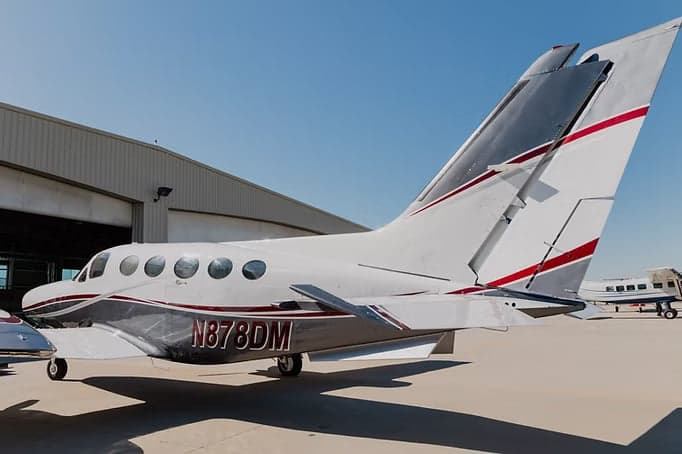 Front view of a Beechcraft aircraft on the tarmac.