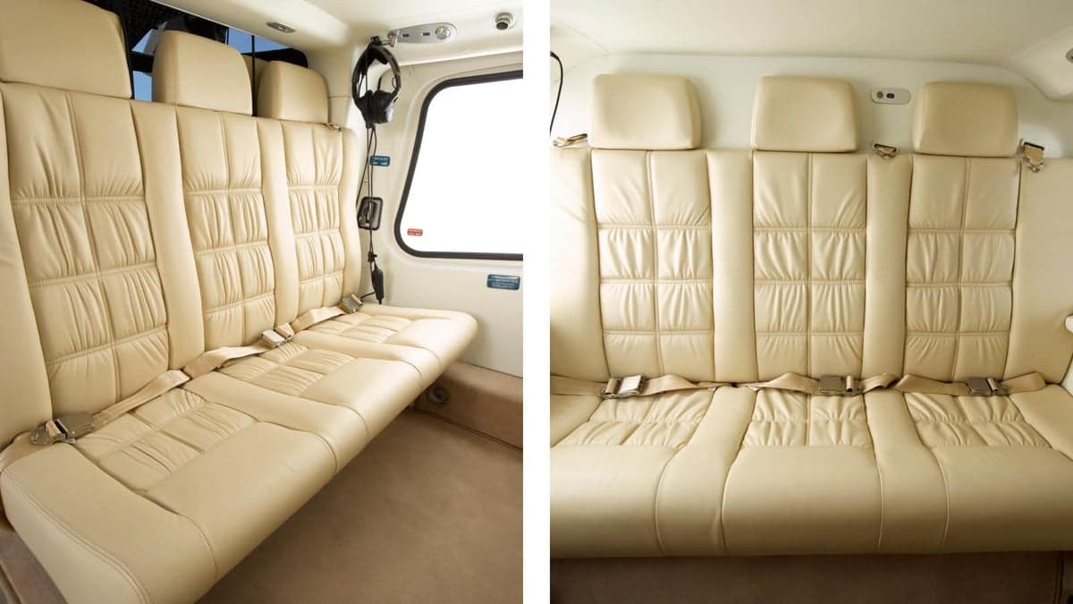 Two views of the interior of the AgustaWestland AW119 Koala helicopter, showing the cream-colored leather seats.