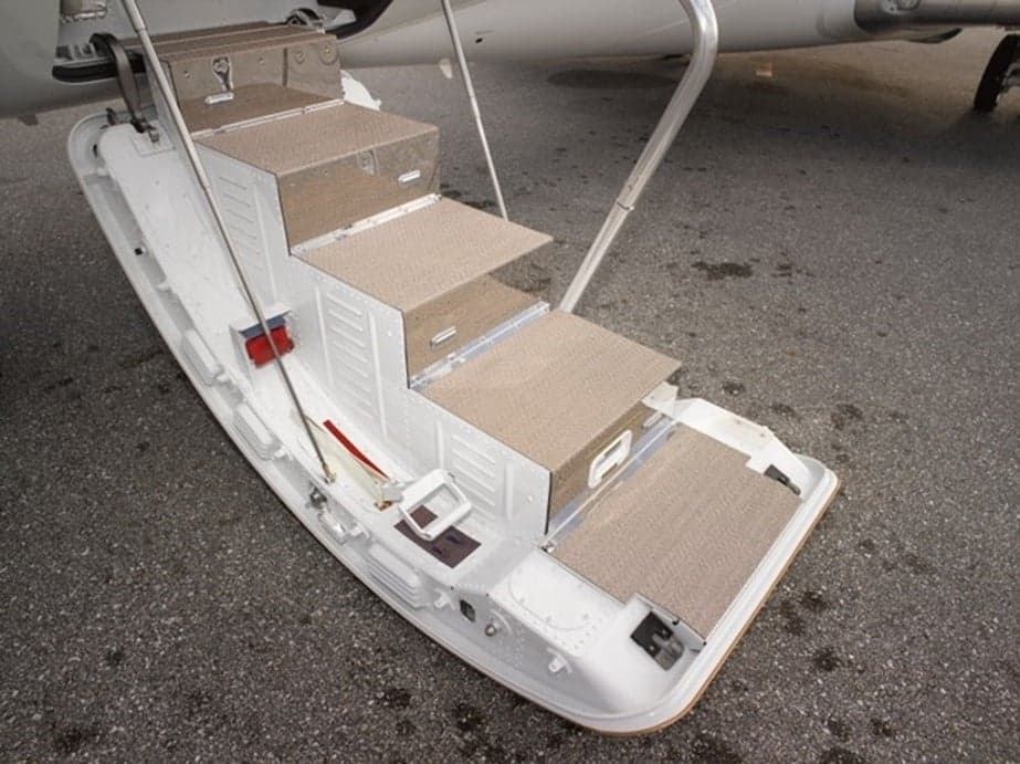Aircraft stairs extended from the side of the plane.