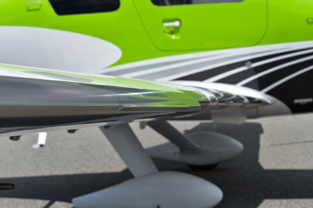 Cessna TTX with open doors on the tarmac, showing tail number N1477B.
