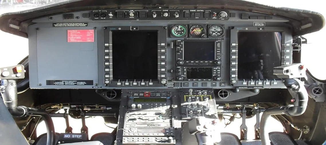 Close-up of the helicopter's instrument panel and controls.