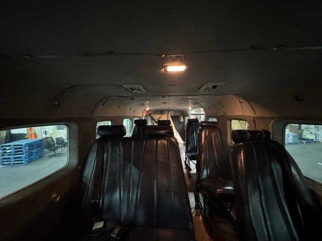 View of the aircraft's cabin interior with seats.