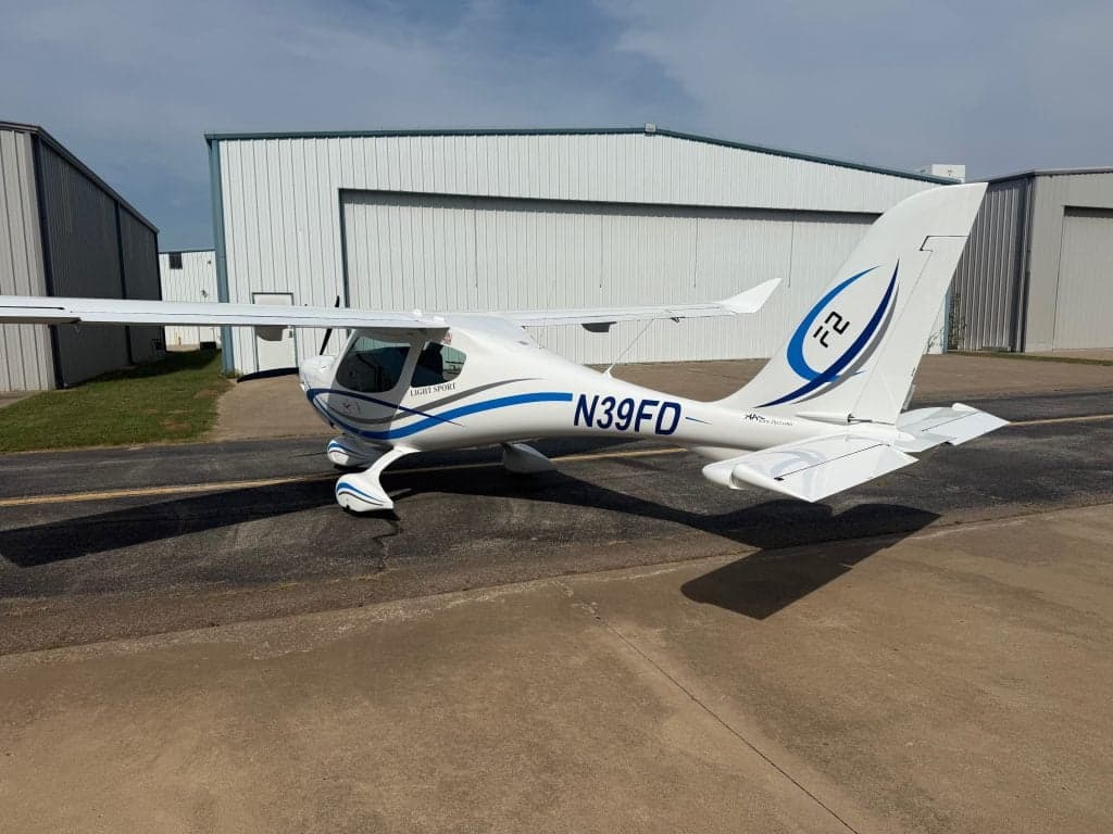 A Flight Design F2 aircraft with registration N39FD parked on the tarmac.