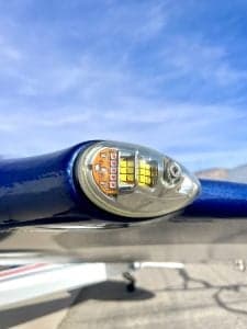 Close up of the front of a blue Carbon Cub FX3 aircraft.