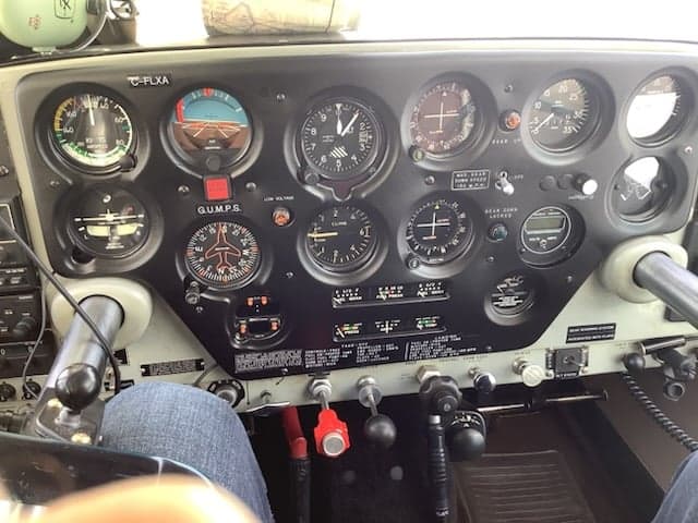 View of the aircraft's instrument panel from the pilot's seat.