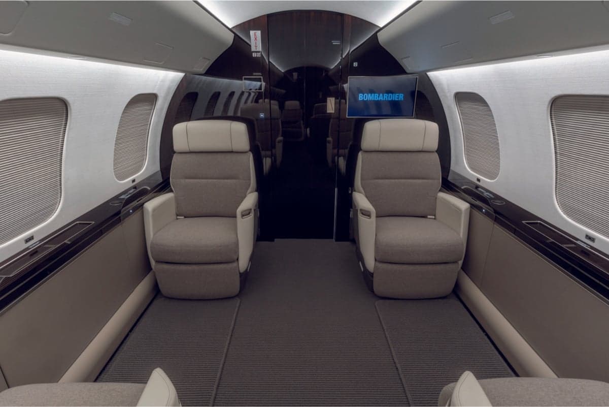 Bombardier aircraft interior with two forward-facing seats.