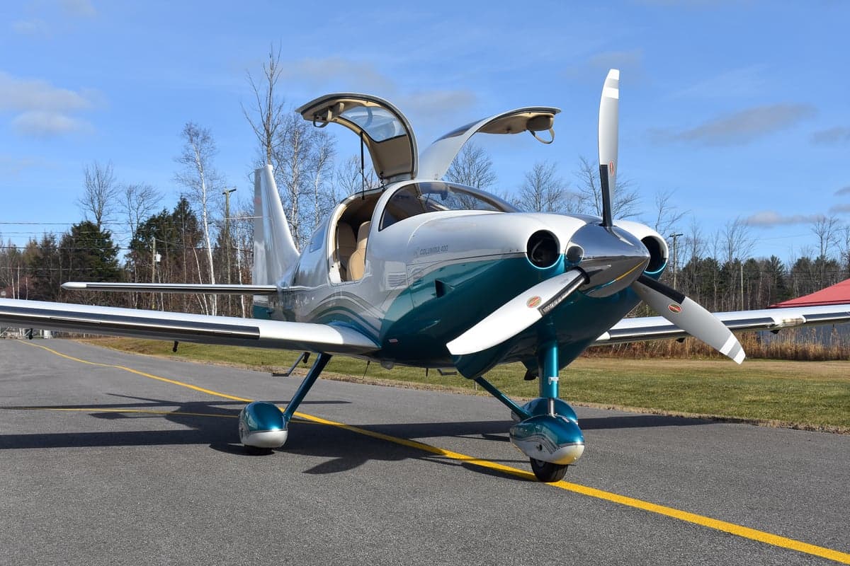 Front view of a Columbia 400 aircraft on the tarmac.