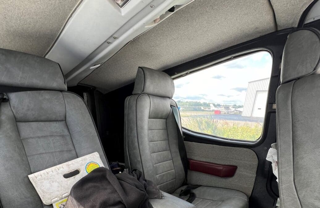 View of the rear seats inside the aircraft cabin.