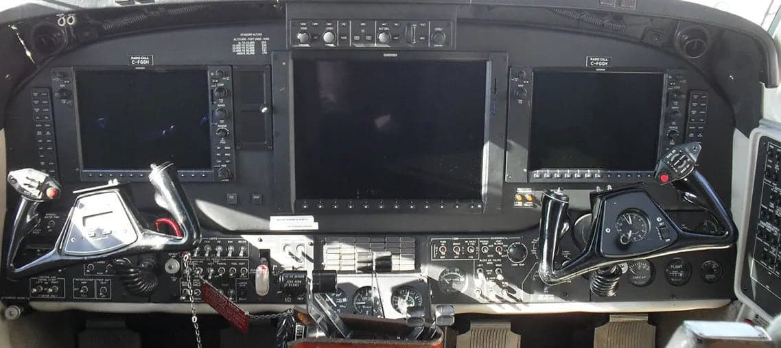 The cockpit of a King Air aircraft with Garmin avionics.