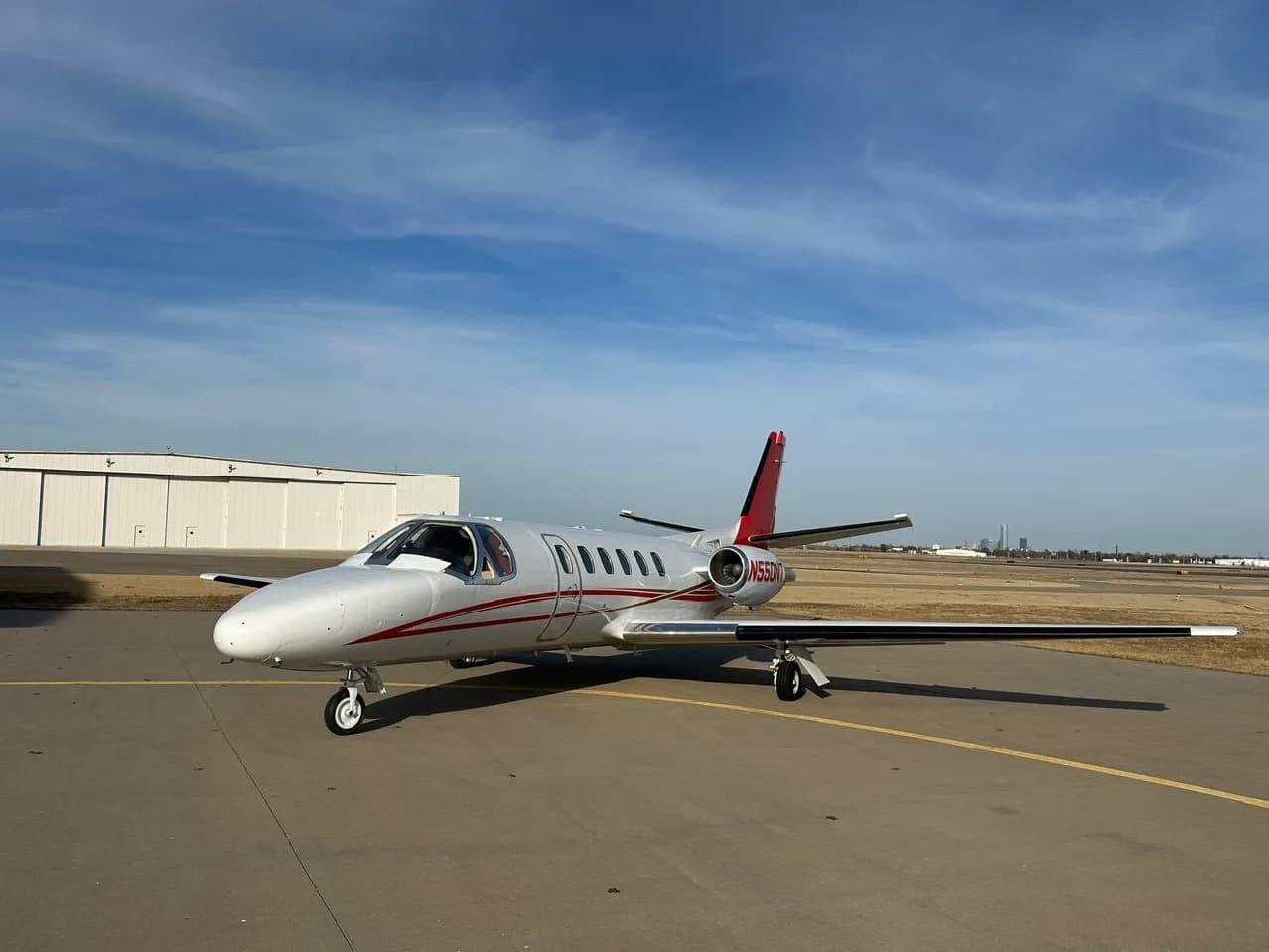 Cessna Citation CJ1+ aircraft N550NT parked on the tarmac.