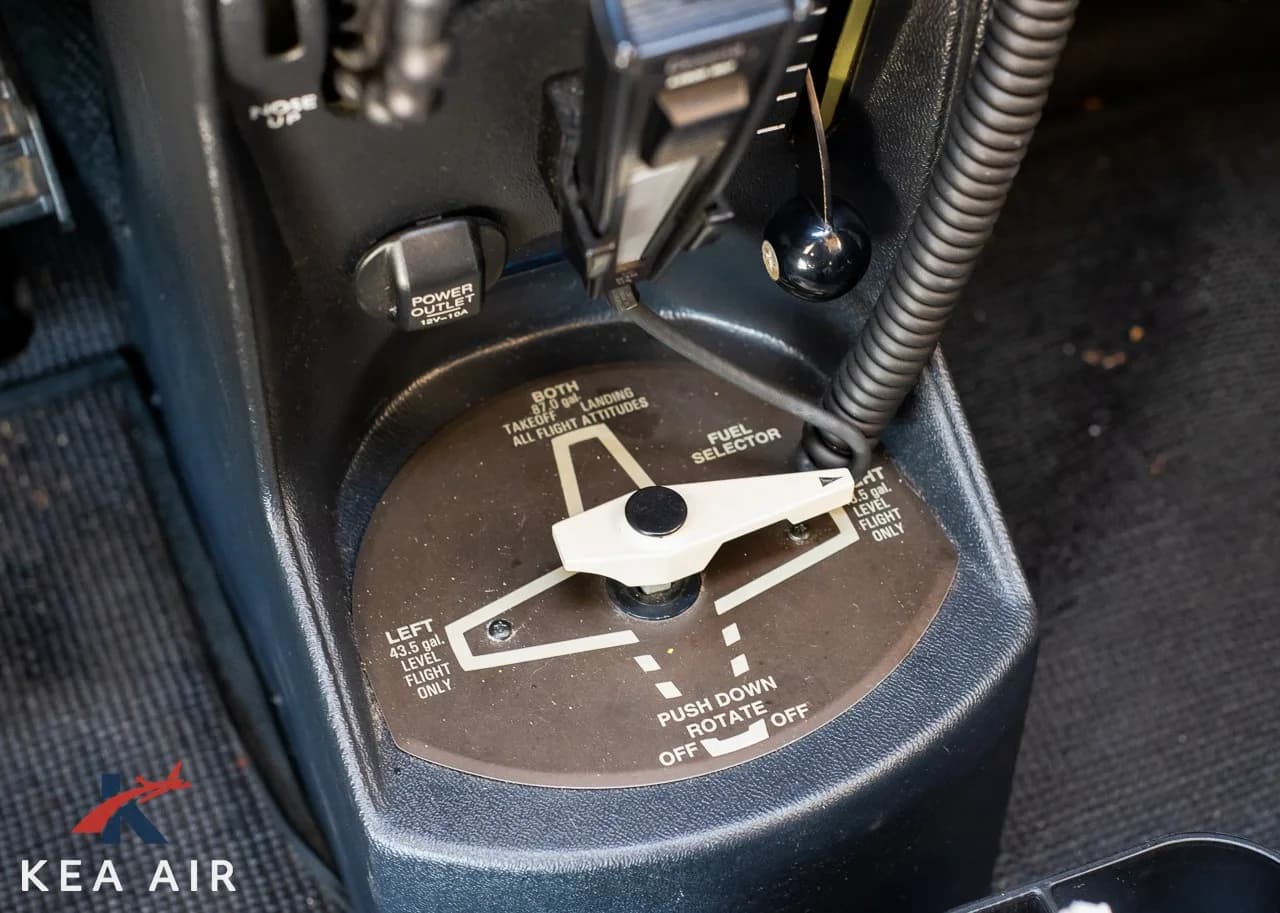 Close-up of the fuel selector in the cockpit of the aircraft.