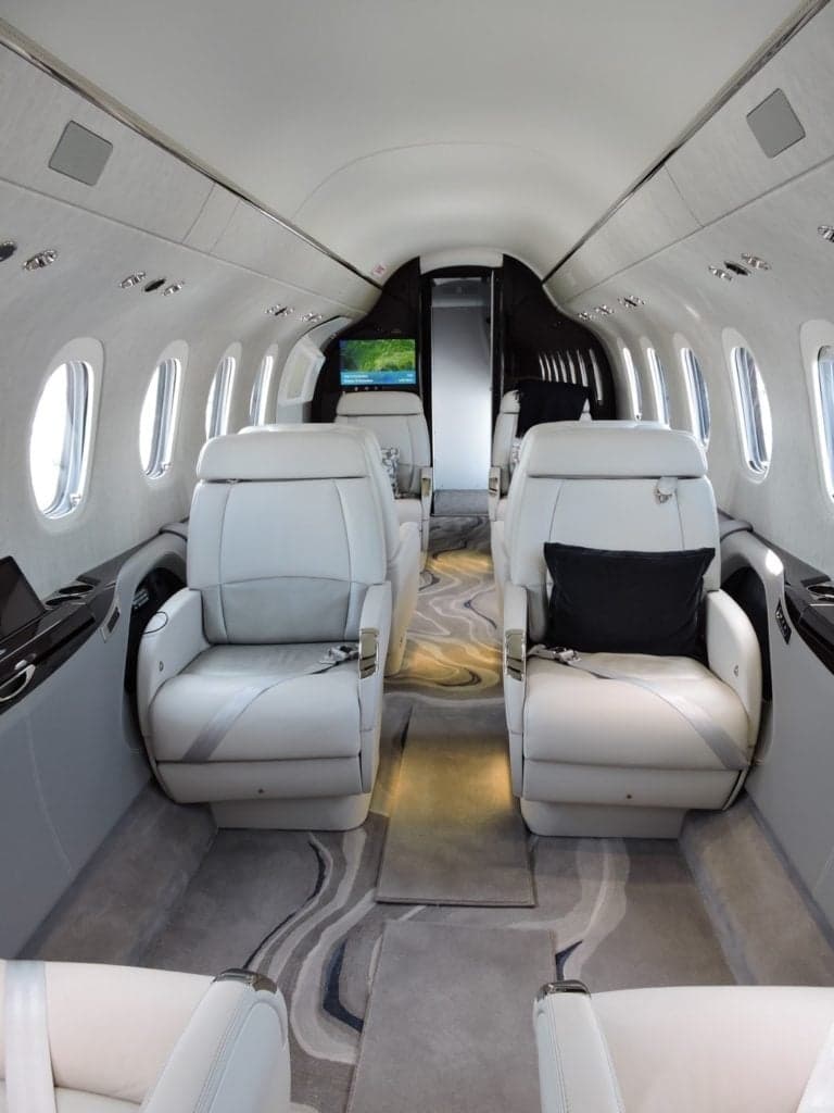 View of the interior cabin of a Citation Longitude jet.
