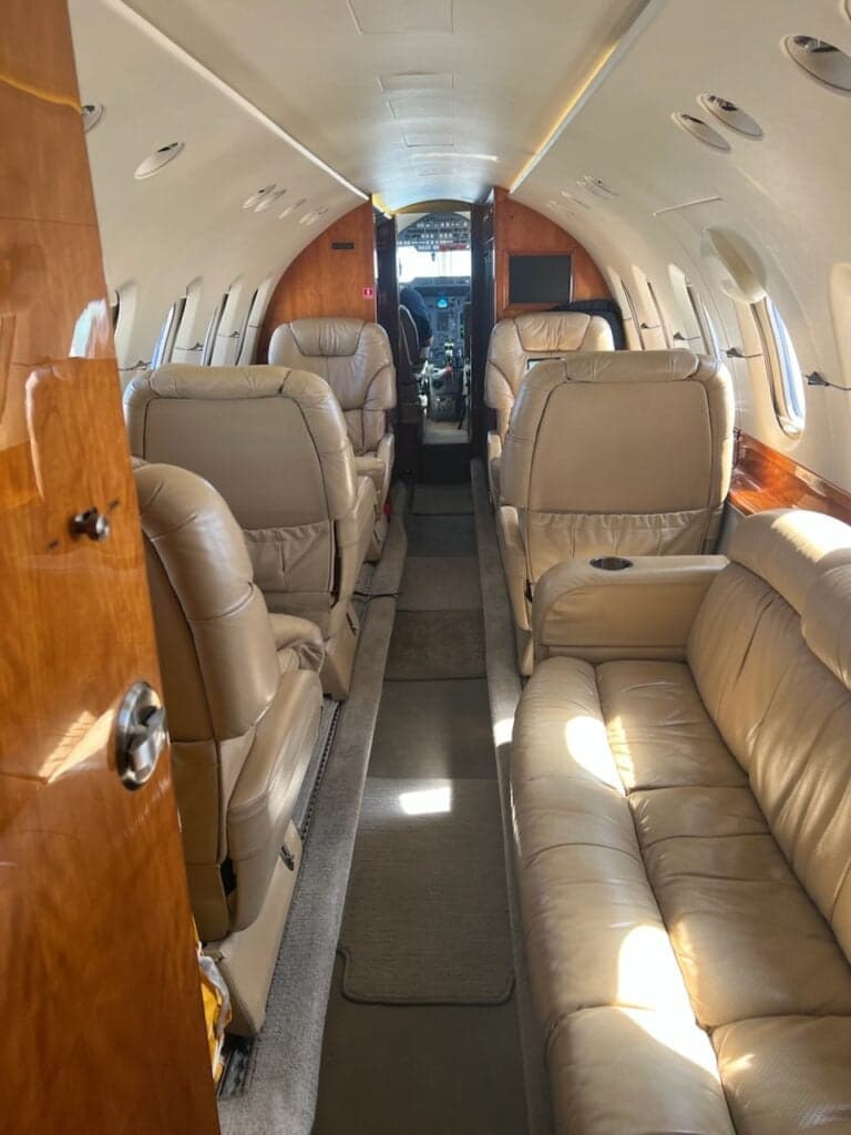 Hawker 750 with open airstair on the ramp.