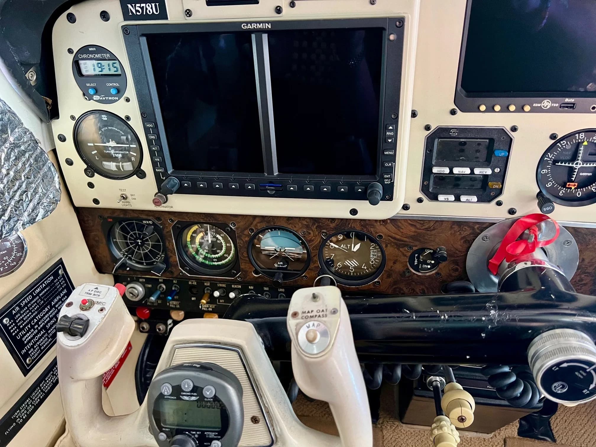 Close-up of the aircraft's avionics and instrument panel, including the Garmin display.