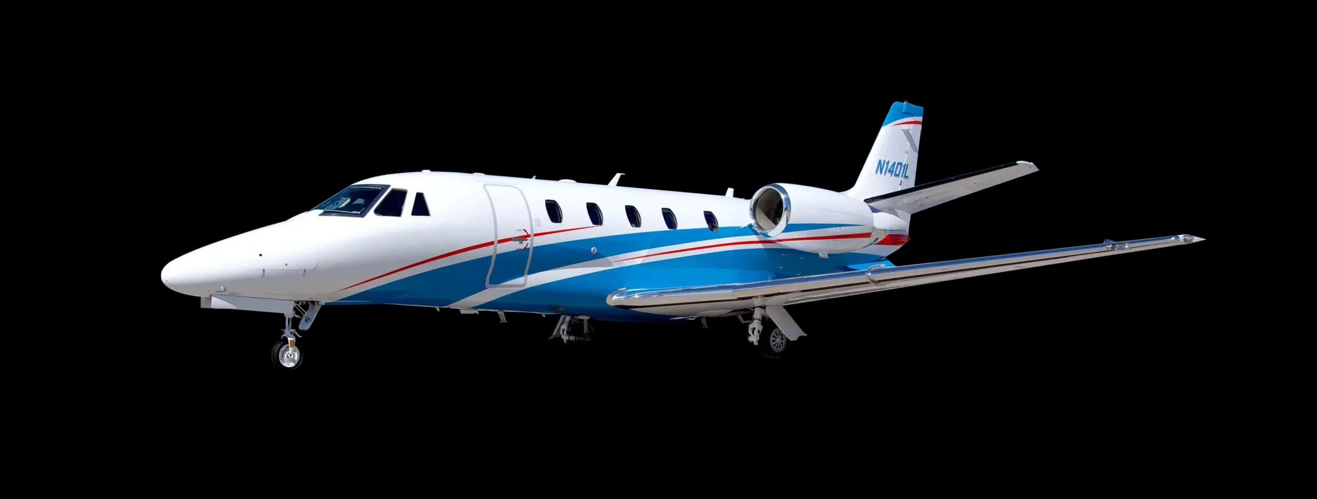 A white and blue Cessna Citation business jet, N1401L, on a black background.