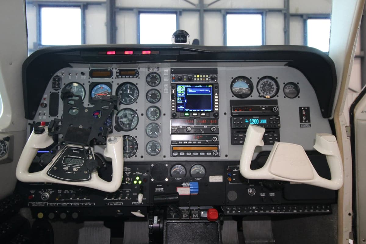 Detailed view of the aircraft's instrument panel and yokes.