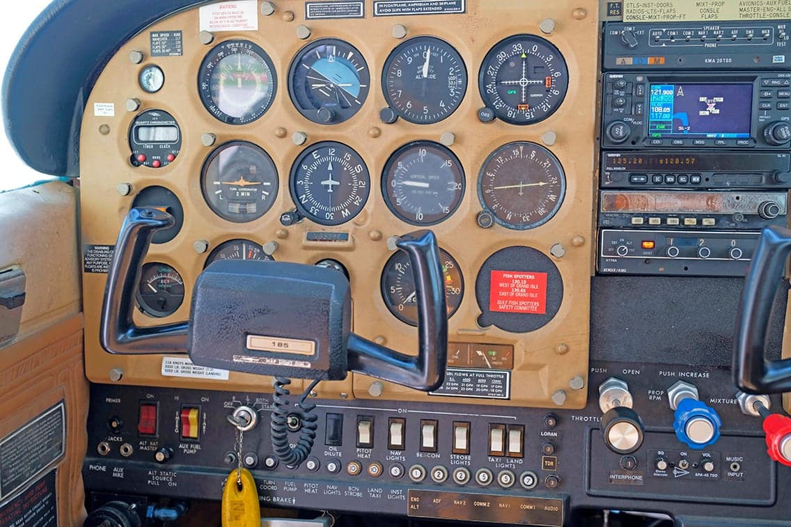 Detailed view of the Cessna 206 instrument panel and controls.