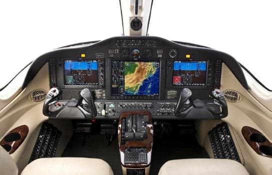 Detailed view of the Citation Mustang cockpit instrument panel.