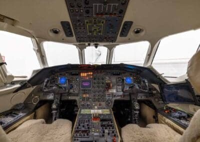 View of the aircraft cockpit with instrument panel.