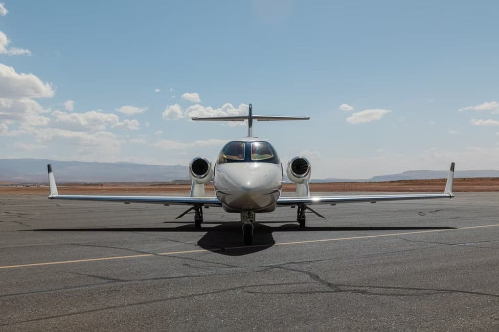 Front view of a HondaJet on the tarmac.