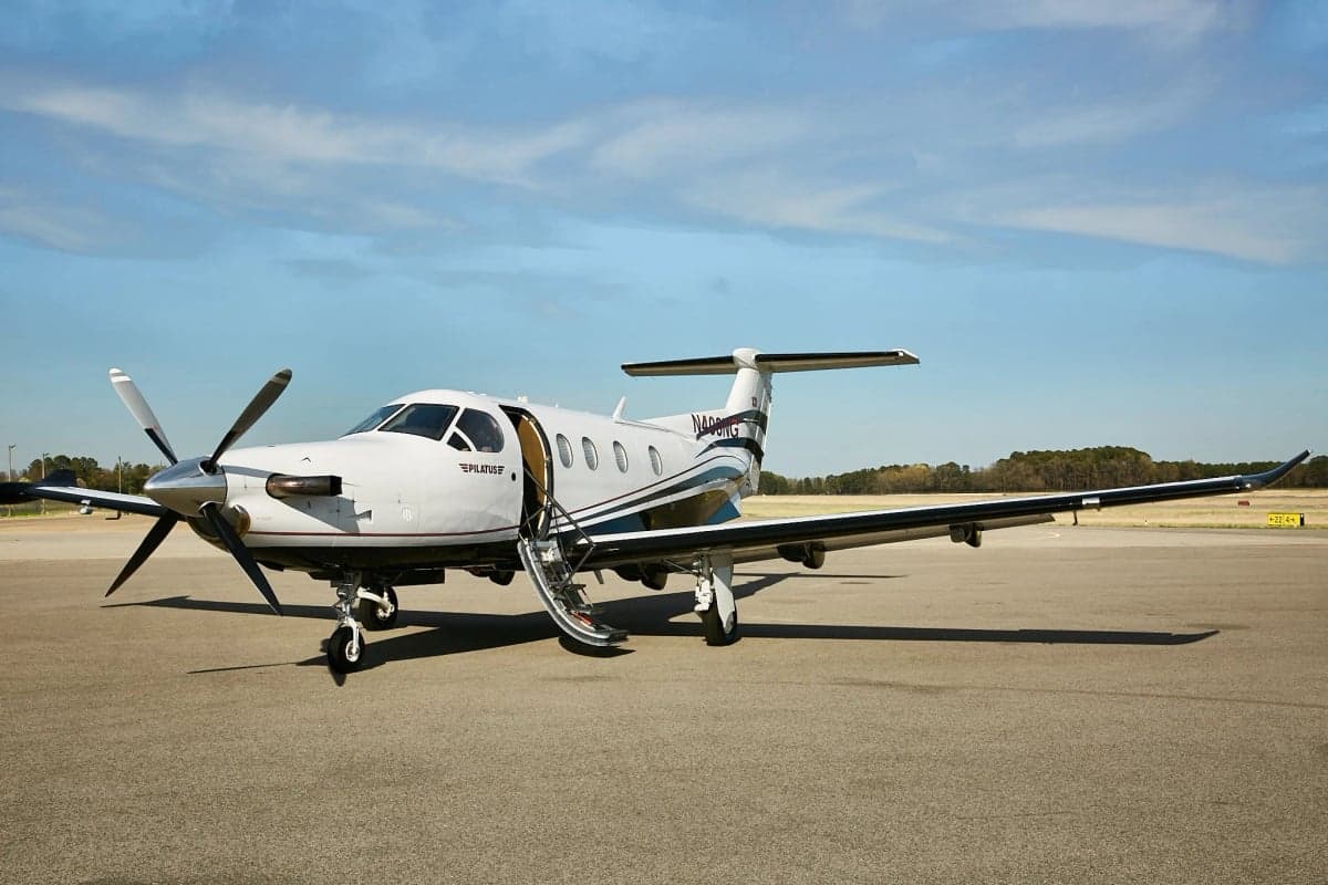 Pilatus PC-12NG on the tarmac with the entry stairs down.
