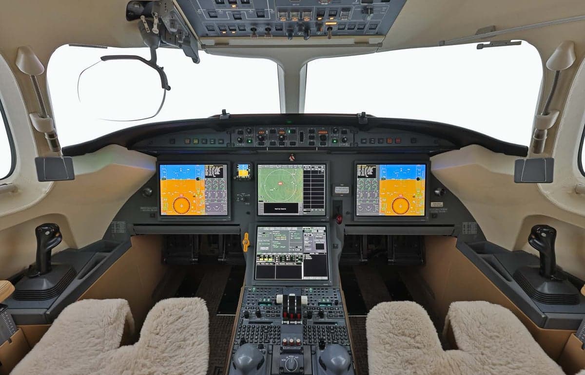 The cockpit of the aircraft features a full instrument panel and control systems.