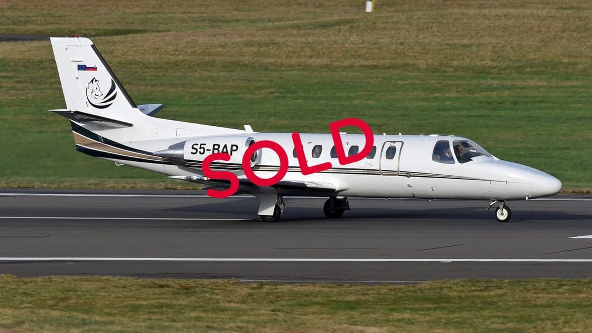 A Cessna Citation CJ1 aircraft with registration S5-BAP on a runway, marked as SOLD.
