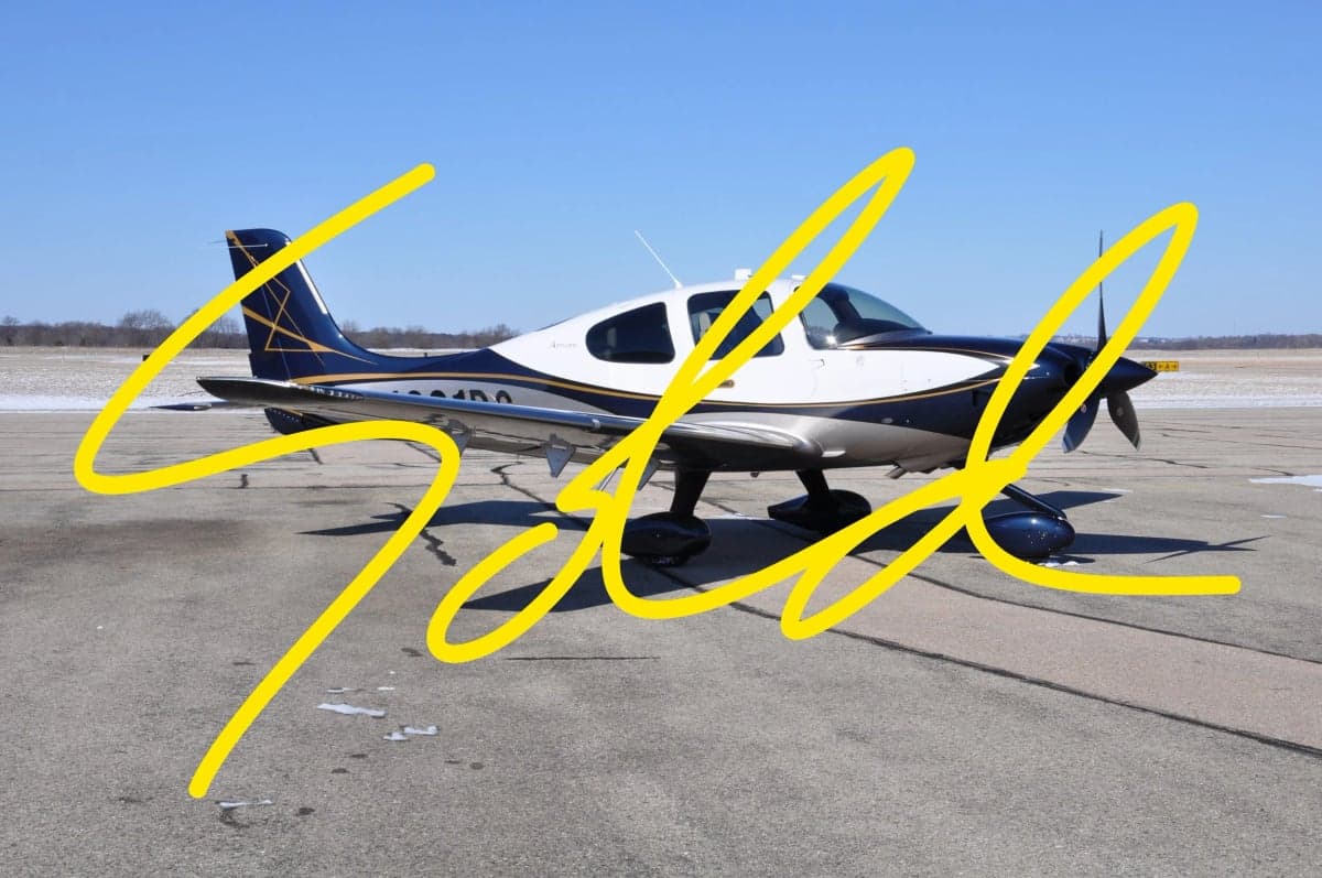 A Cirrus SR22 aircraft is parked on the tarmac with a 'SOLD' overlay.