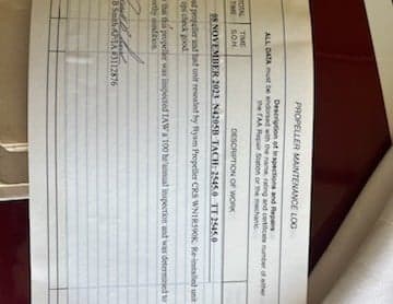 Close-up of aircraft inspection documentation.