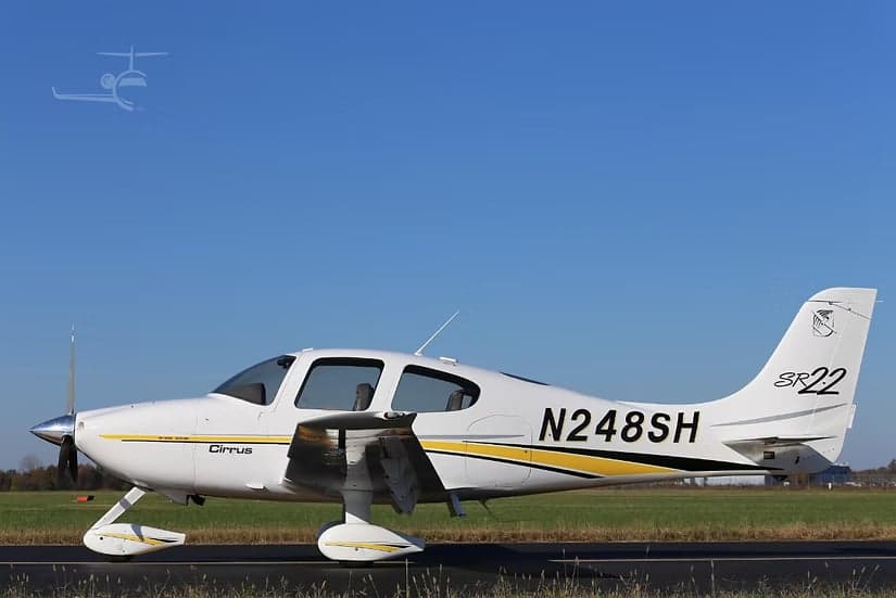 Side view of a Cirrus SR22 aircraft with its registration number N248SH visible.