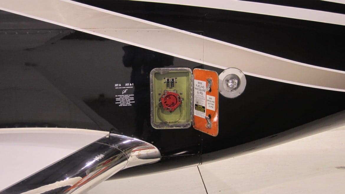 Close up of the fuel filler port on the side of the aircraft.