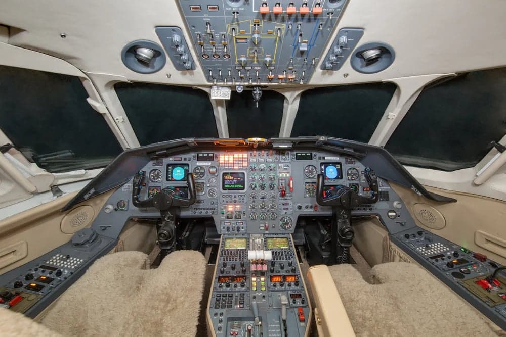 The cockpit of the Falcon aircraft features a full instrument panel.