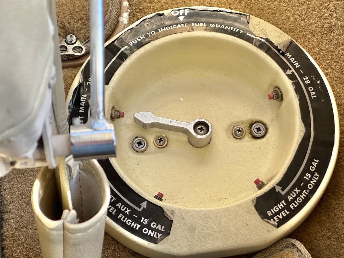 Close-up of the fuel selector valve in the cockpit.